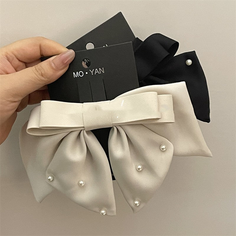 Pince à cheveux nœud Satin Elegance : accessoire élégant pour femme